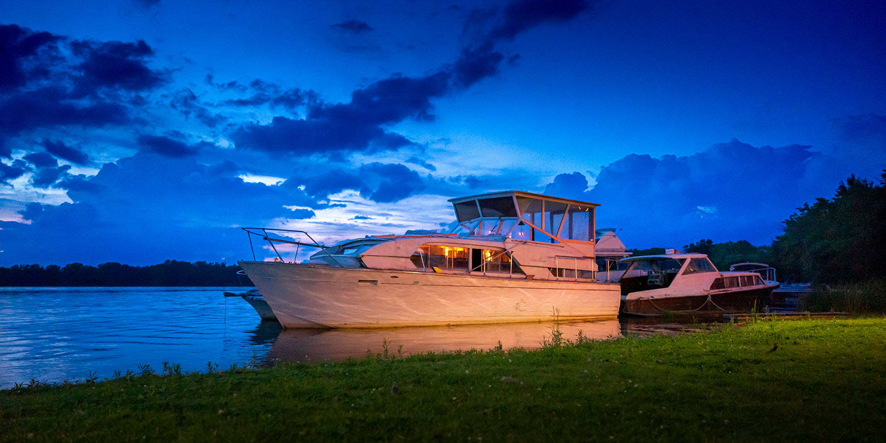 Chris Craft cabin cruiser at Sunset