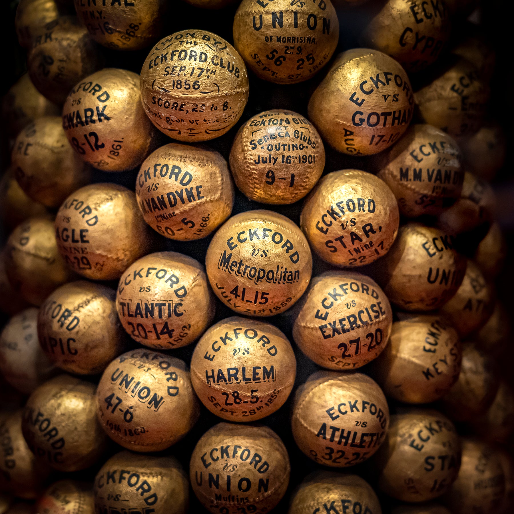 a display of baseballs from the Eckford Club