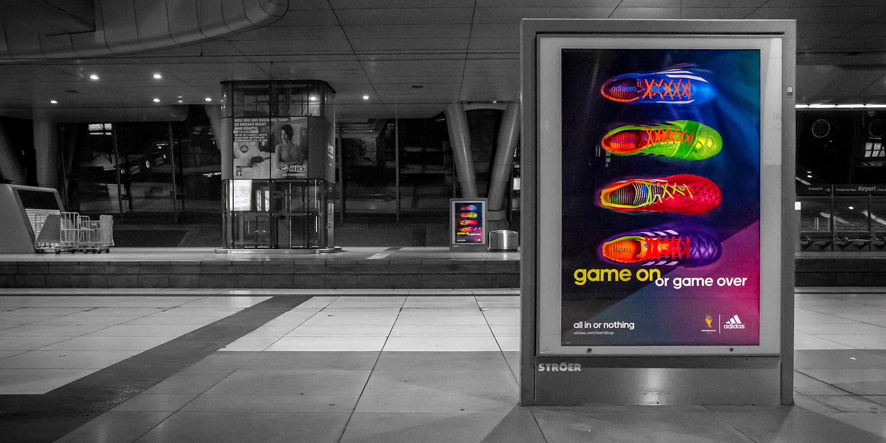 A colorful advertisement on the Frankfurt Airport train platform