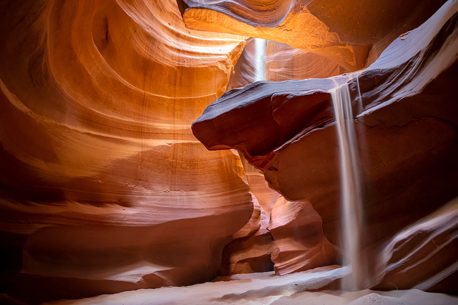 falling sand in Upper Antelope Canyon