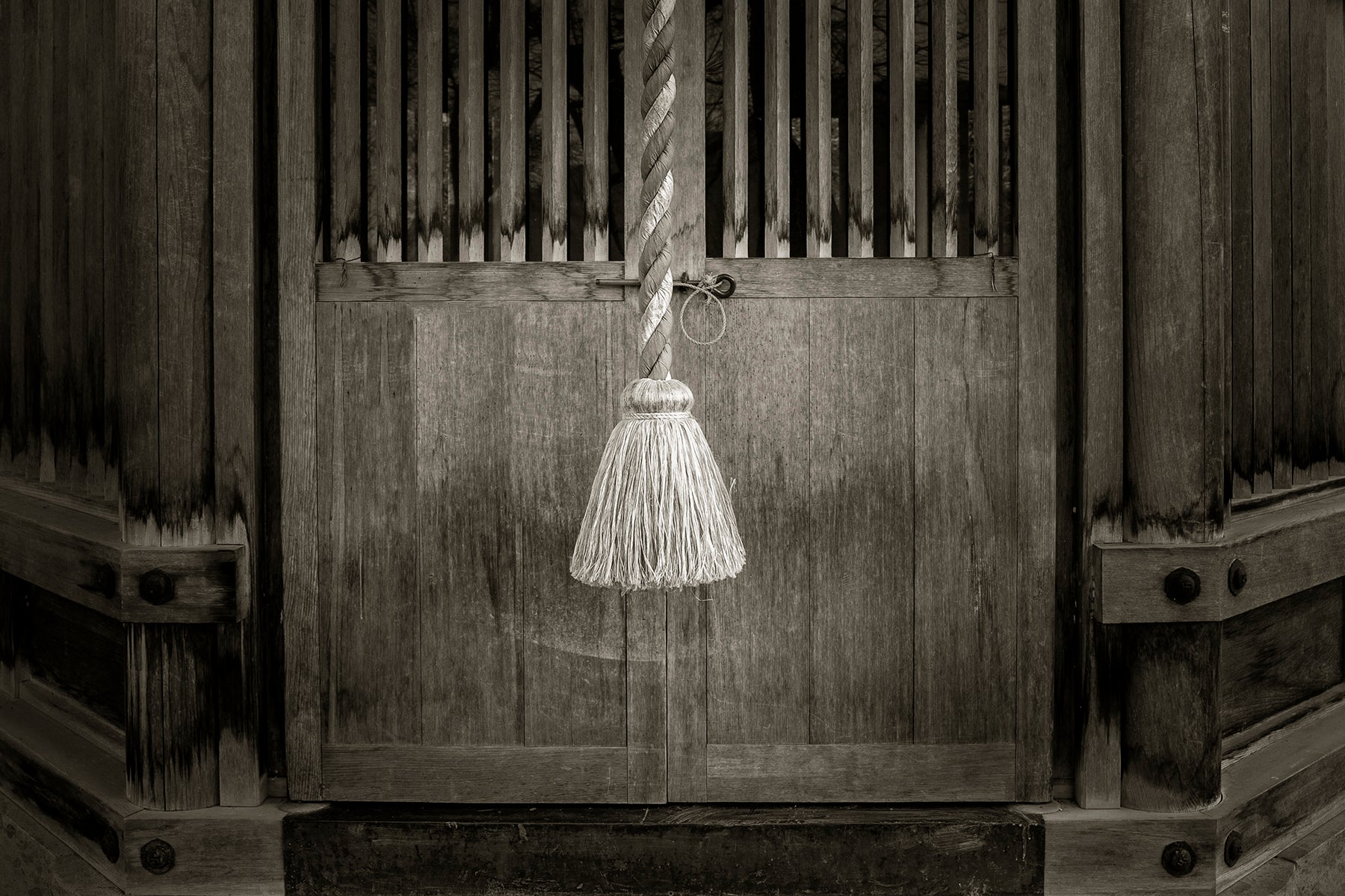 a rope used to sound the waniguchi or gong at a Shinto Shrine