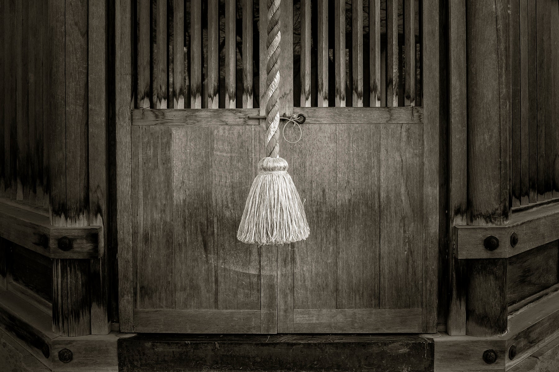 a rope used to sound the waniguchi or gong at a Shinto Shrine