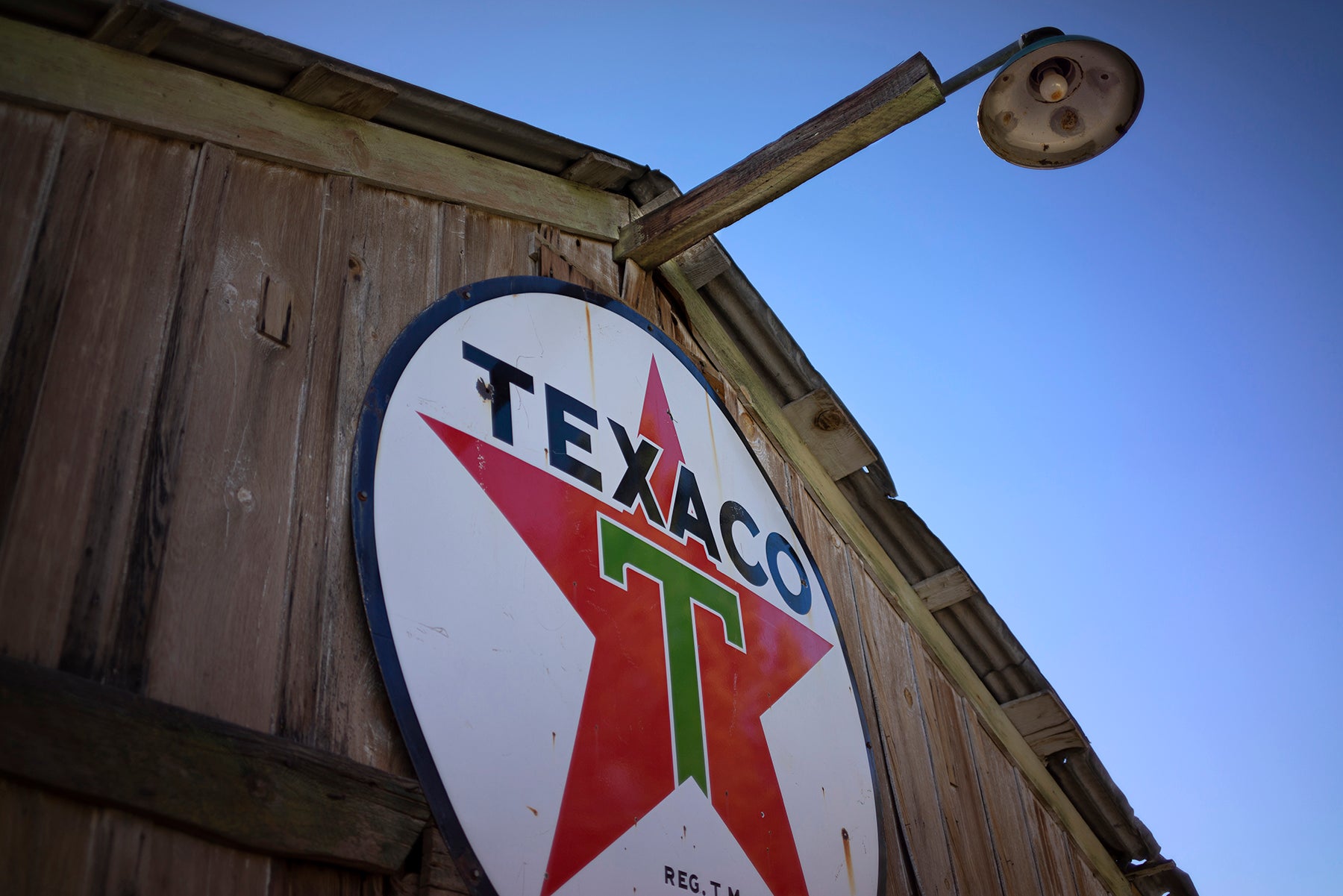 An old Texaco Star sign on a barn