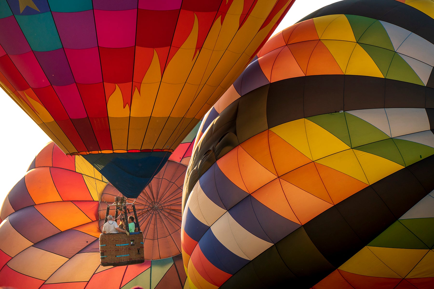 Hot air balloons launch at dawn